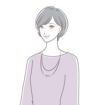 ネックレスを着けて微笑むショートヘアの女性のイラスト